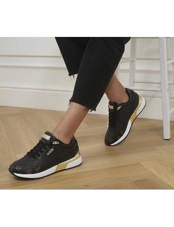 black and gold guess trainers