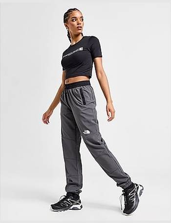 The North Face Tek woven track pants with reflective piping in black
