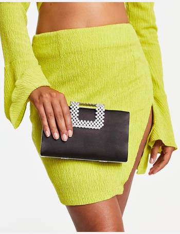 True Decadence envelope clutch bag in muted gold
