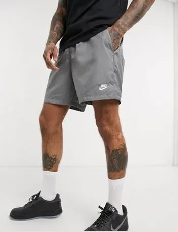 nike club essentials woven flow shorts yellow
