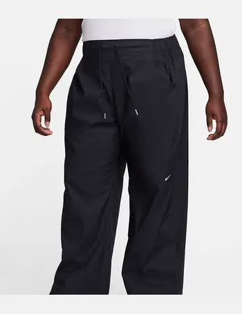 Nike Trend woven baggy parachute pants in light blue