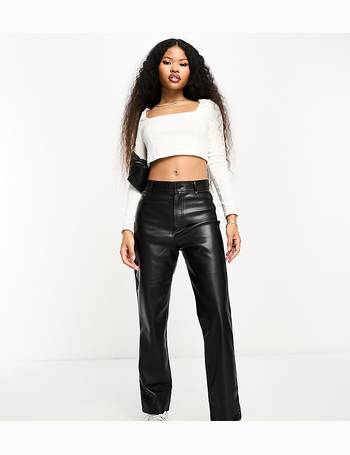 Stradivarius + STR Petite faux leather trousers in green