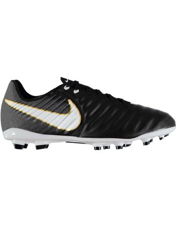 black nike football boots with gold tick