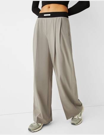 Wide-leg tailored fit trousers with elastic waist - Women