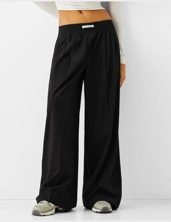 Wide-leg tailored fit trousers with elastic waist - Women