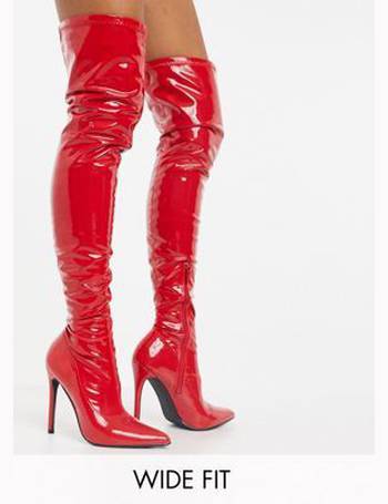 red vinyl knee high boots