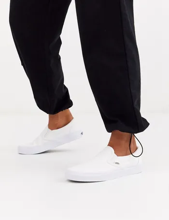 Vans platform store white slip on