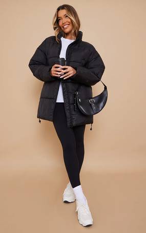 Shop PrettyLittleThing Women's Black Long Puffer Coats up to 75