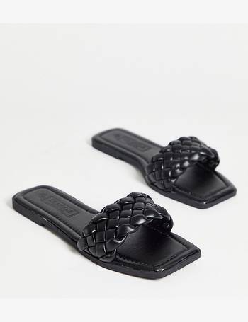 Truffle Collection chunky buckle sliders in black