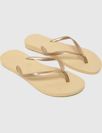 Shop Havaianas Women's Gold Sandals up to 60% Off