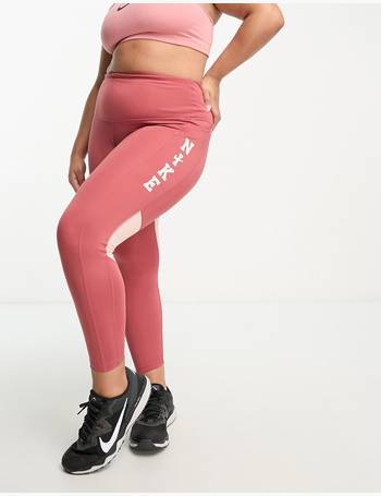 Nike Running Swoosh Dri-FIT 7/8 leggings in purple, ASOS