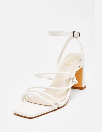 Quiz best sale white sandals