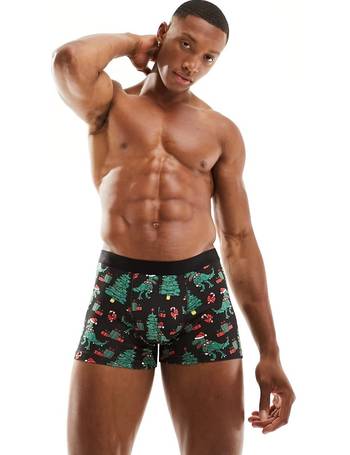 ASOS DESIGN christmas short trunks with candy cane print