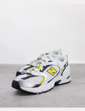 new balance 530 trainers in off white and yellow