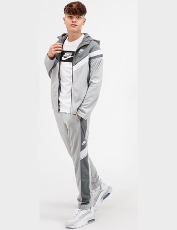 Nike woven tracksuit outlet junior