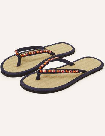 Black seagrass flip discount flops