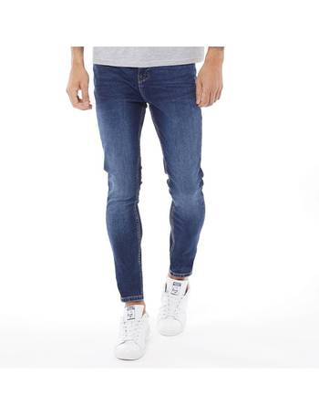 ASOS DESIGN spray on denim shorts in power stretch mid wash