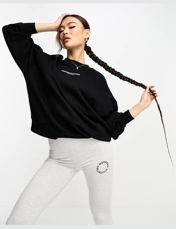 ASOS Weekend Collective oversized sweatshirt with woven logo in black
