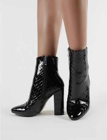 presley ankle boots in black faux suede