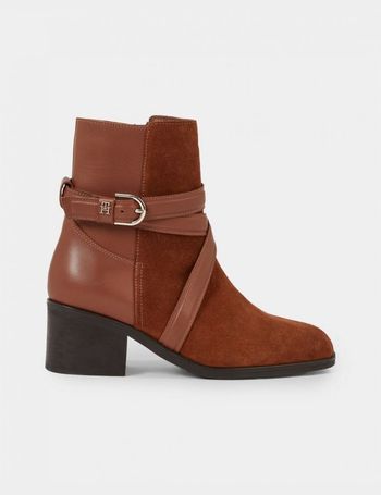 Tommy hilfiger round on sale stud wedge bootie