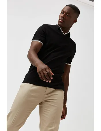 khaki pants and black polo