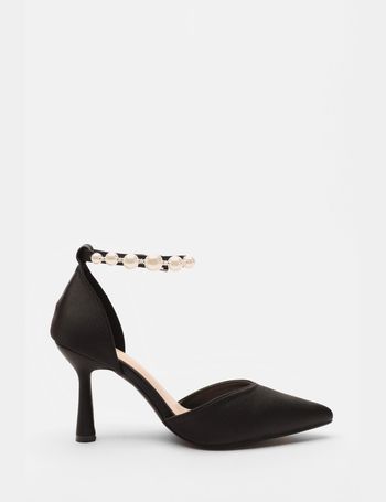 Quiz cross strap clearance low heeled courts