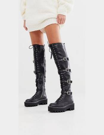 black lace up cleated flat over the knee boot