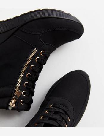 black faux fleece cuff wedge heel trainers