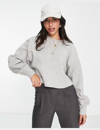 ASOS DESIGN oversized sweatshirt with raw hem in cream