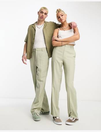 COLLUSION Unisex parachute trousers in white